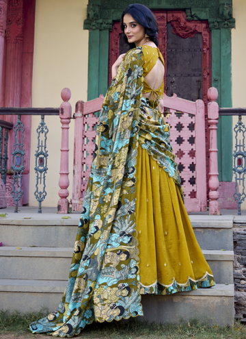 Amazing Musturd Yellow SIlk lehenga choli with sequin embroidery and kalamkari print border